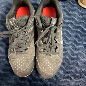 Black under armor baseball cleats